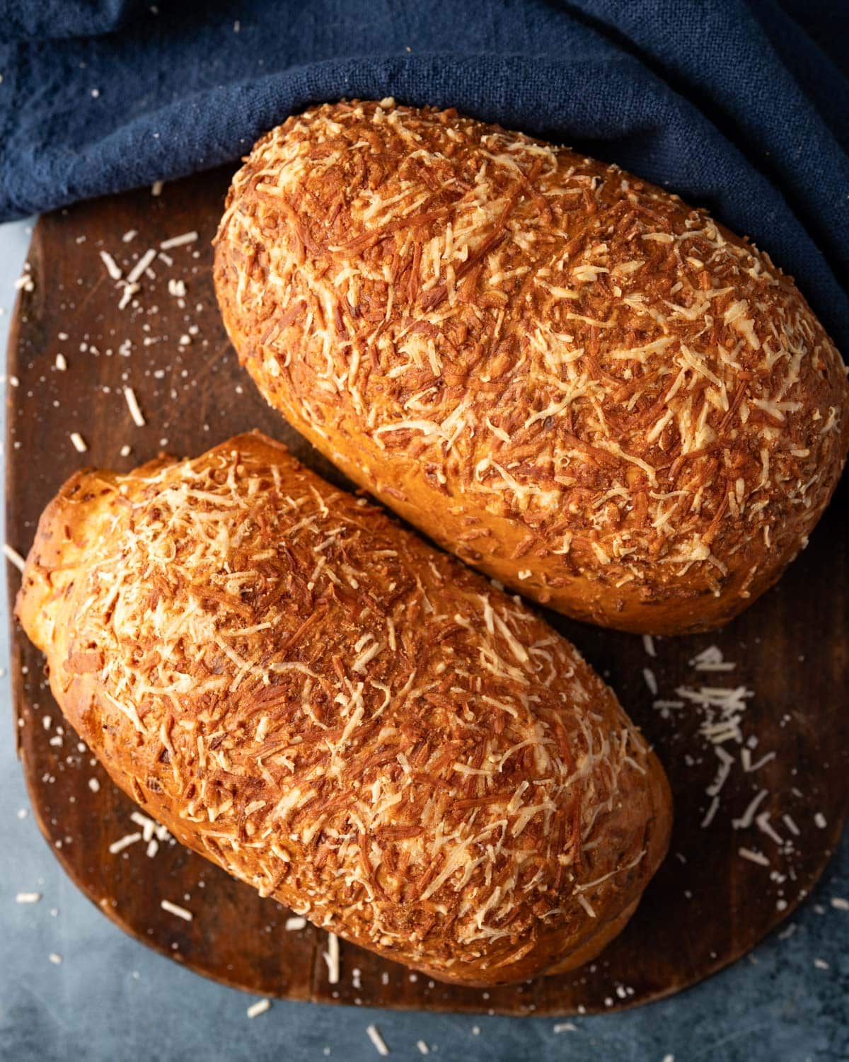 two loaves of asiago cheese bread