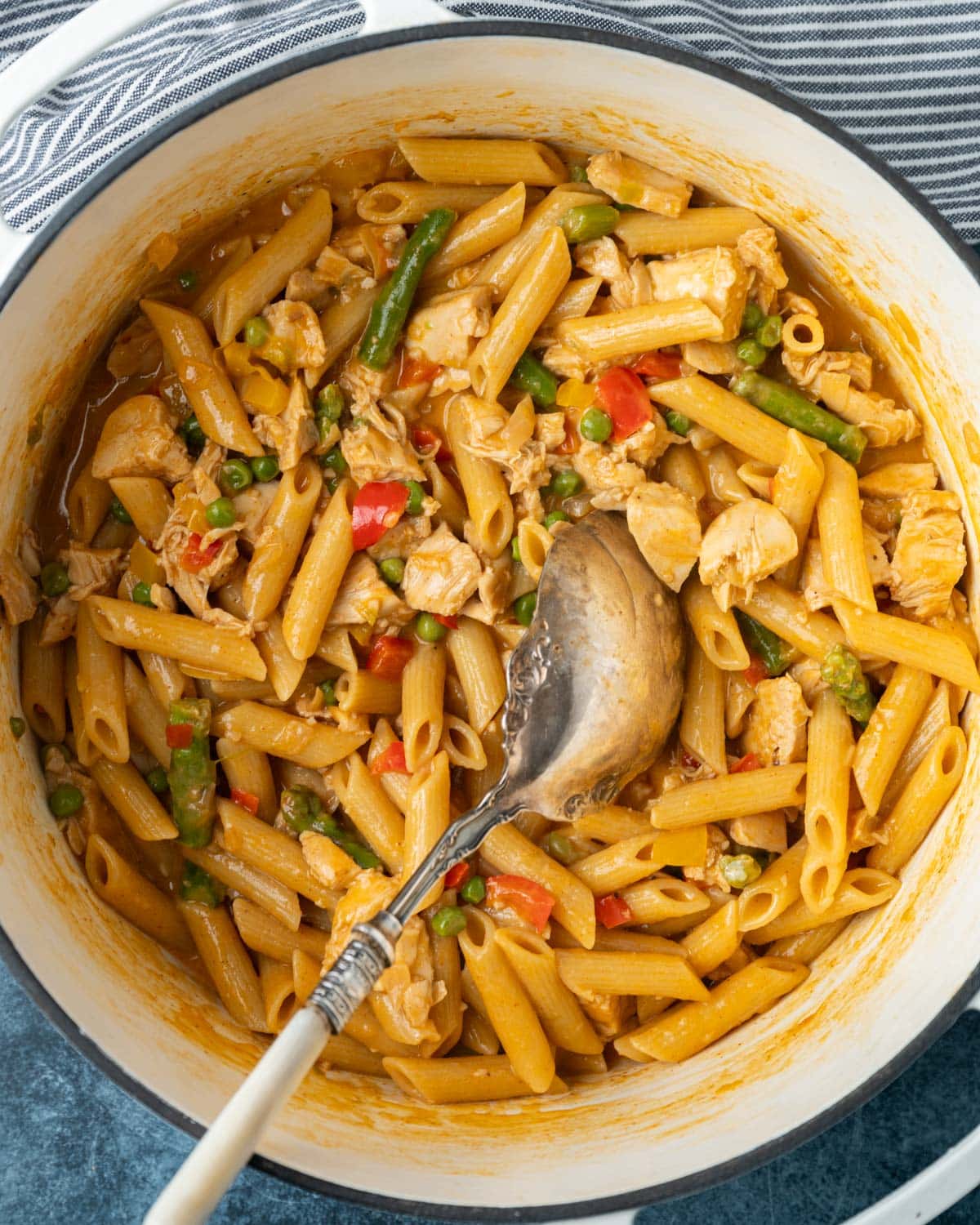 overhead view of spicy chipotle chicken pasta in a pot