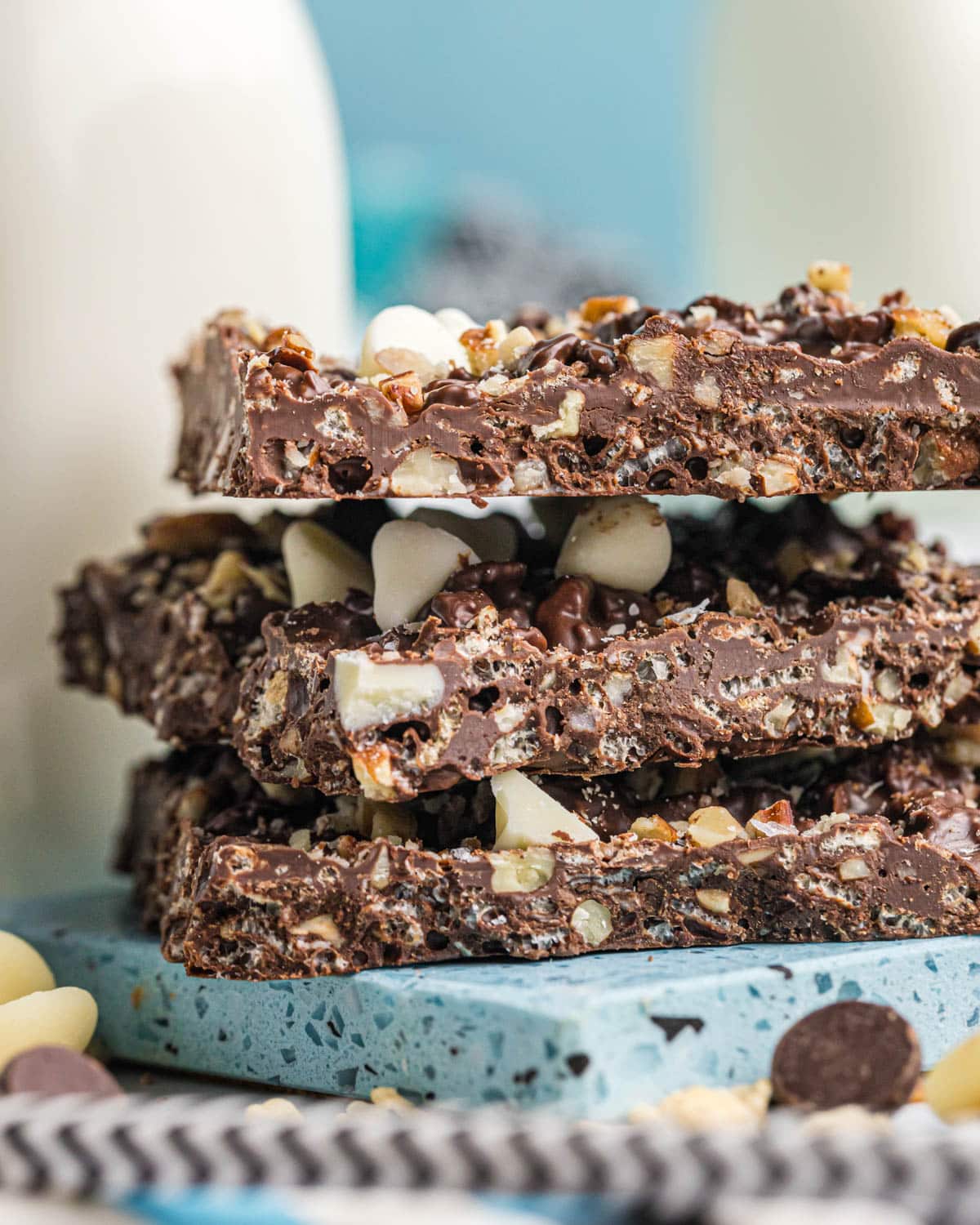 a stack of 3 chocolate crunch bars on a plate