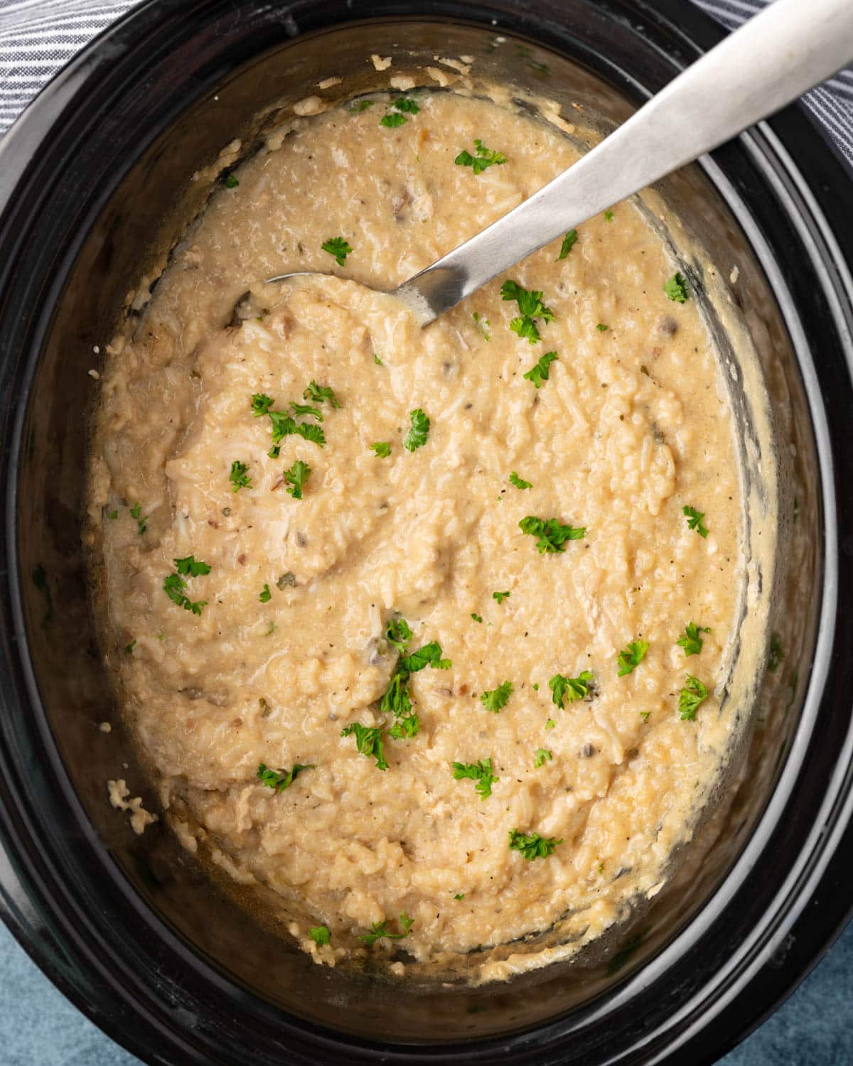 overhead view of crock pot pork chops and rice