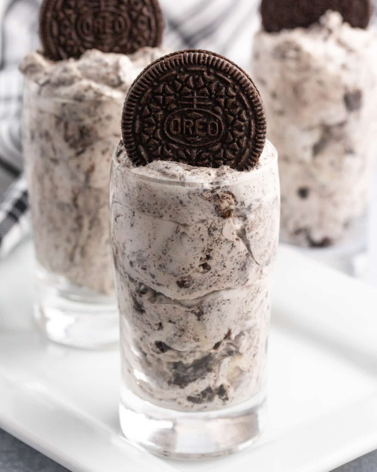 oreo fluff dessert parfait with an oreo on top