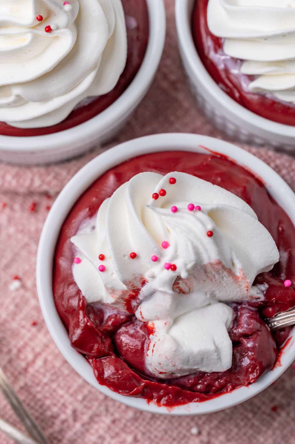 red velvet homemade pudding with a spoon in a cup