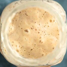 overhead view of sourdough starter in a jar