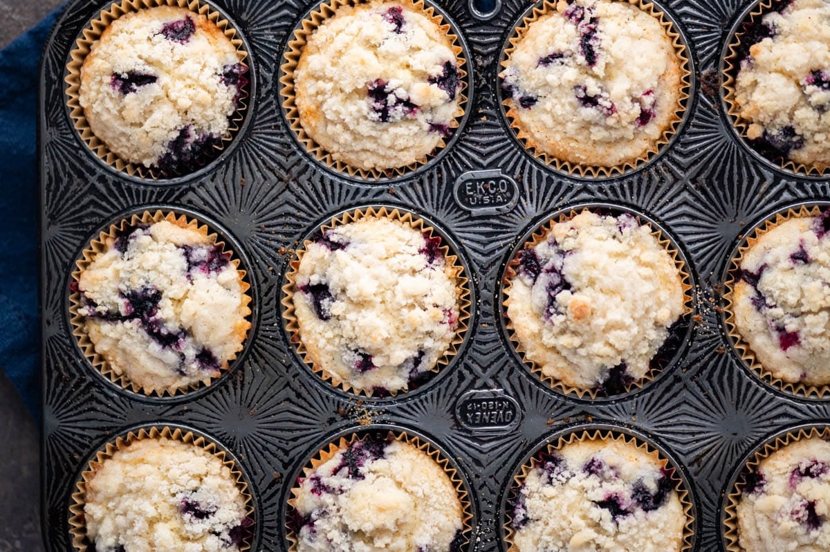 baked blueberry muffins with a streusel topping