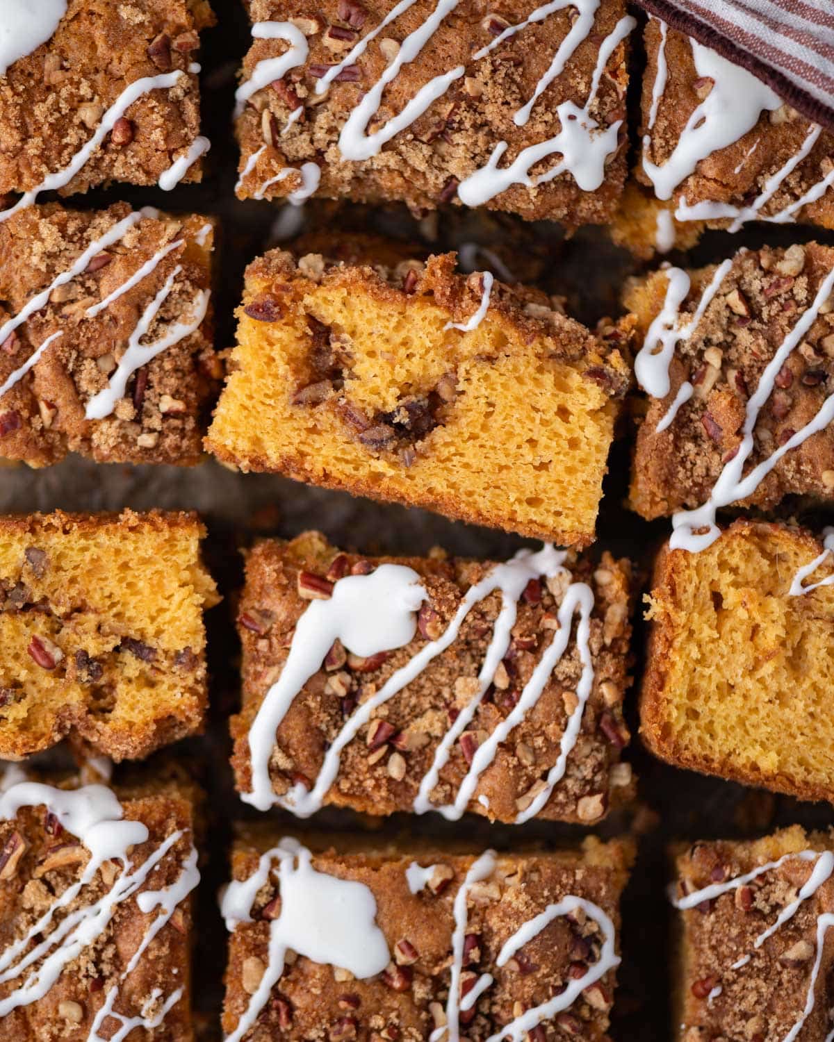 overhead view of butterscotch cake cut into squares