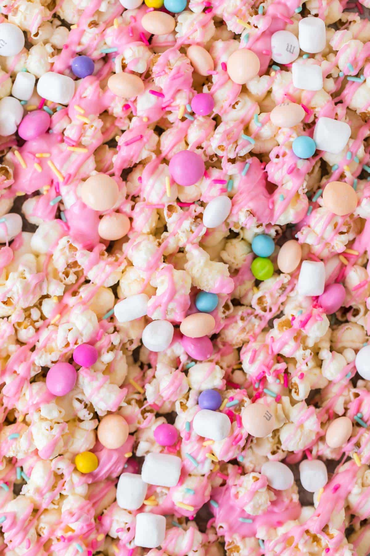 overhead view of a sheet of easter popcorn with candy