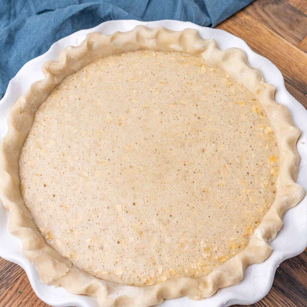 an unbaked oatmeal pie in a pie plate