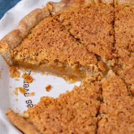 closeup of an oatmeal pie in a white pie pan