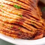 closeup of brown sugar ham in a slow cooker