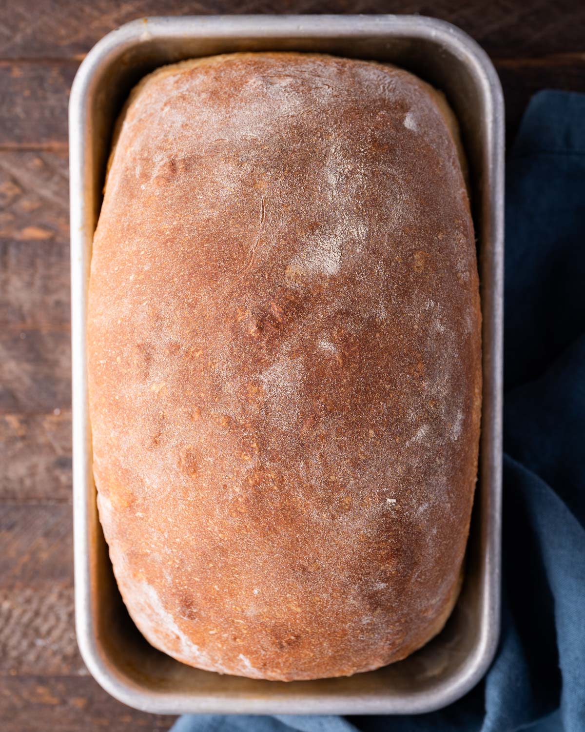 overhead view of white bread in a loaf pan