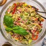 italian sub salad in a bowl with fresh basil