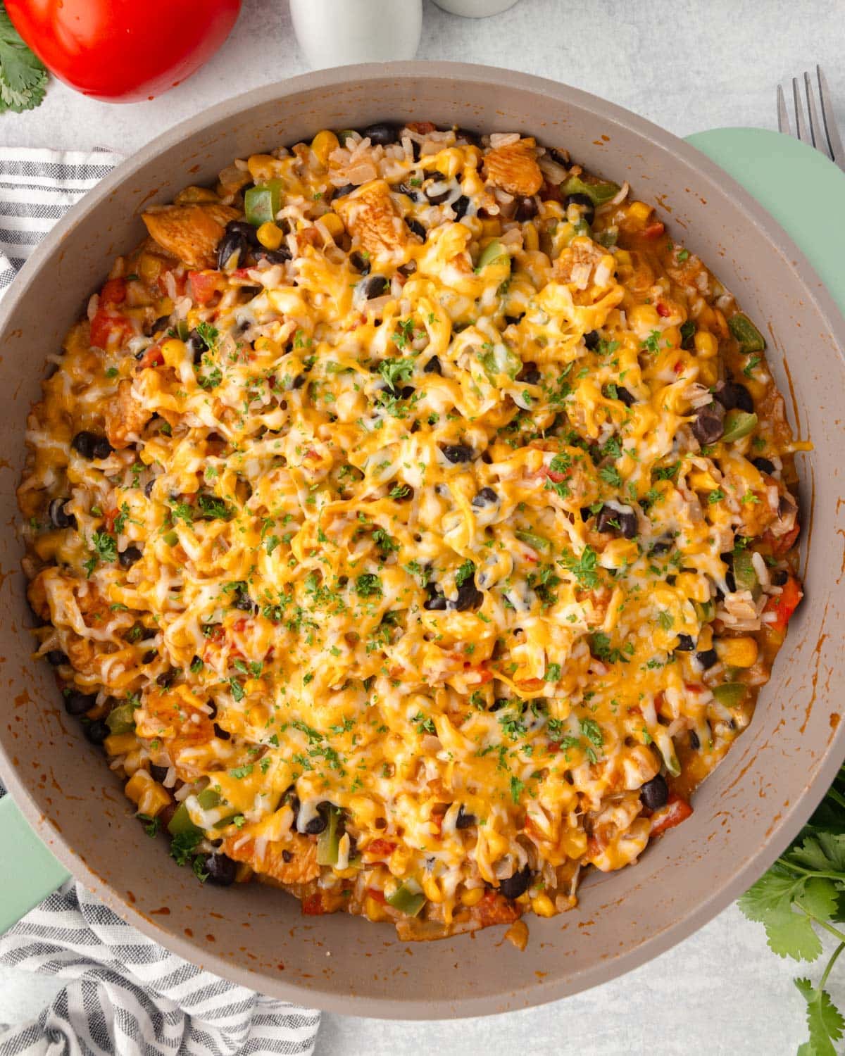 mexican chicken and rice skillet dinner with melted cheese