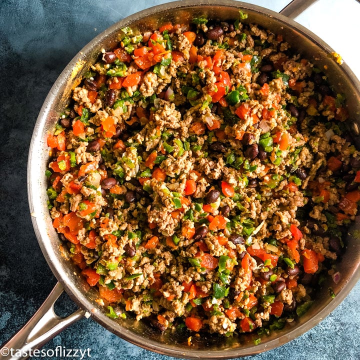 ground beef, pepper, tomato and bean mixture in a skillet