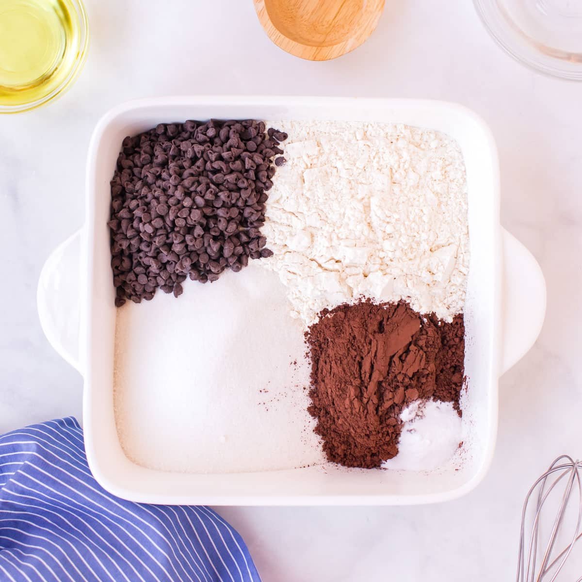 ingredients for crazy cake in a pan