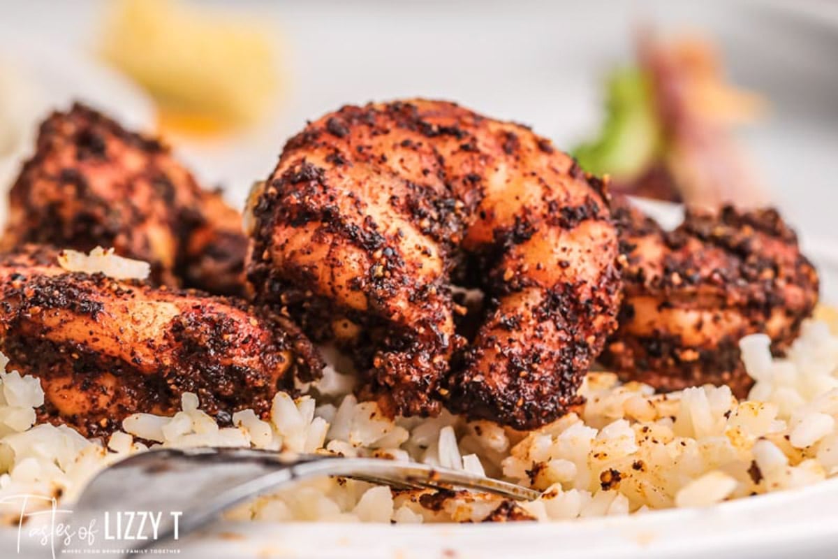 seasoned shrimp and rice on a plate