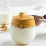 a glass of dalgona whipped coffee