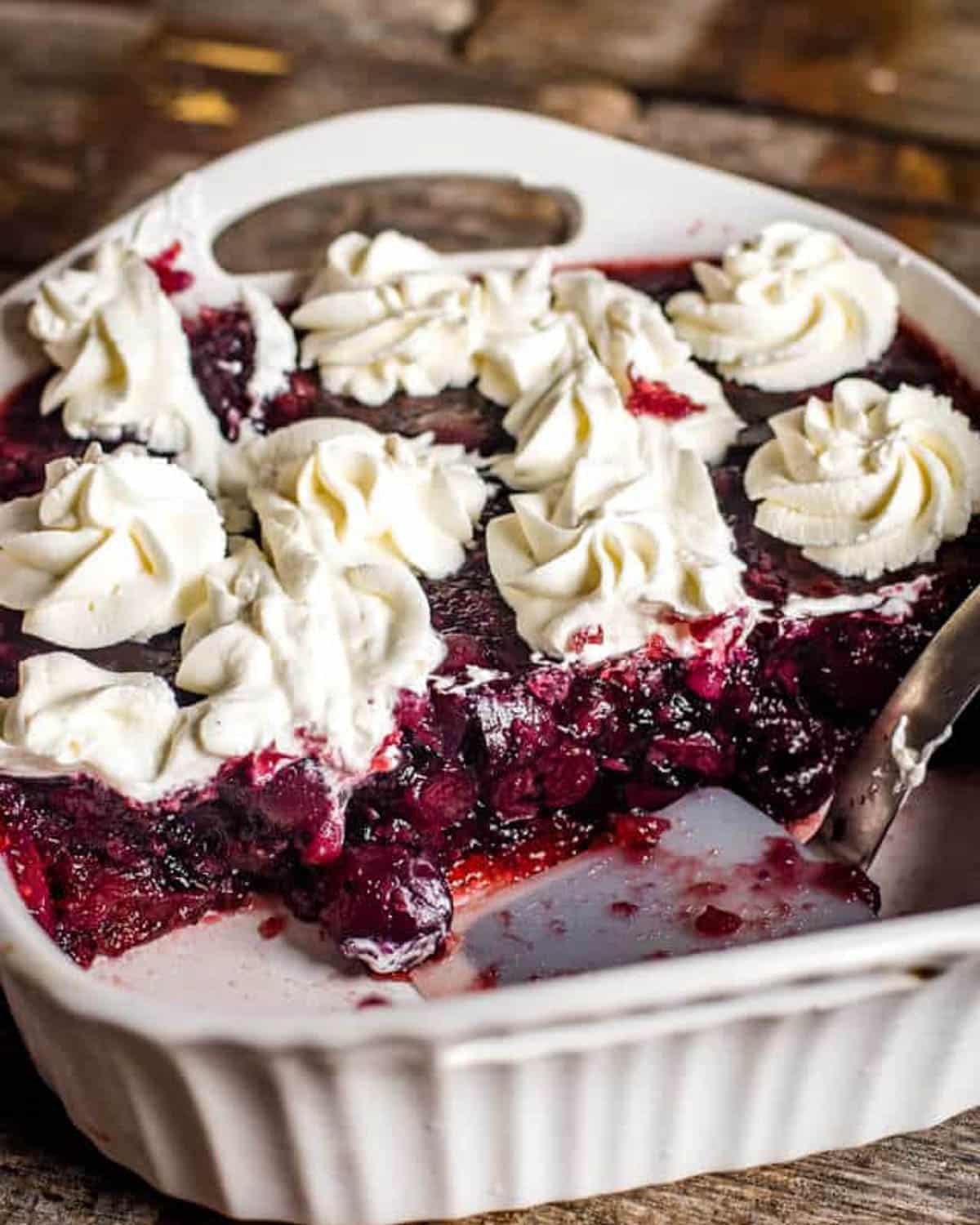 bing cherry salad in a dish with cool whip