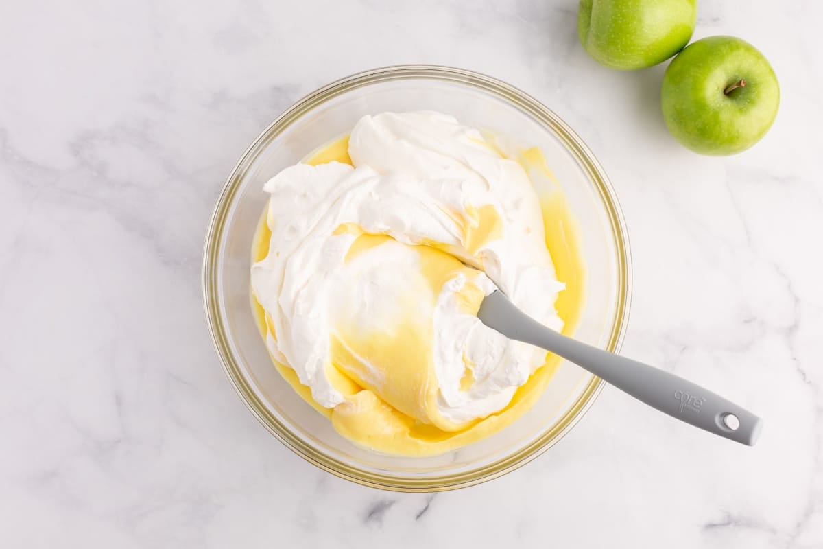 pudding mixed with cool whip in a bowl
