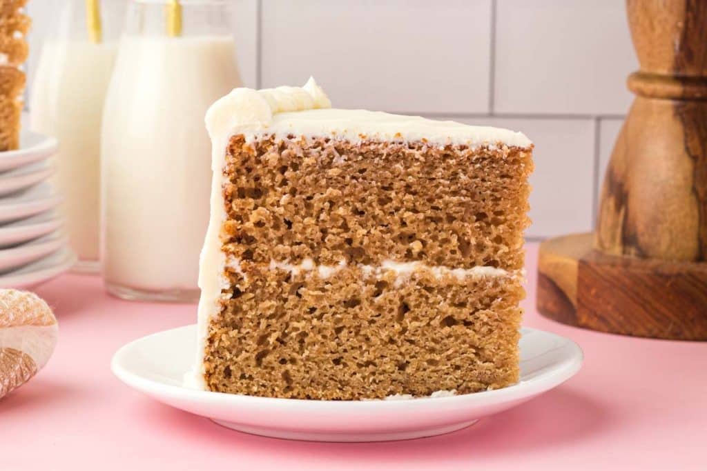 Applesauce Spice Cake slice on a plate.