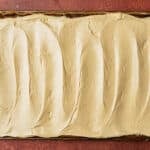 frosted gingerbread cake on a table