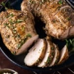 roasted turkey tenderloin sliced on a plate