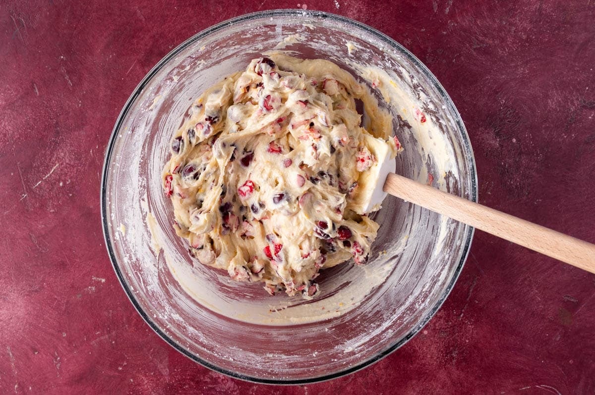 cake batter with cranberries in a bowl