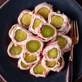 a plate full of pickle roll ups