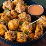 sausage balls in a plate with dip