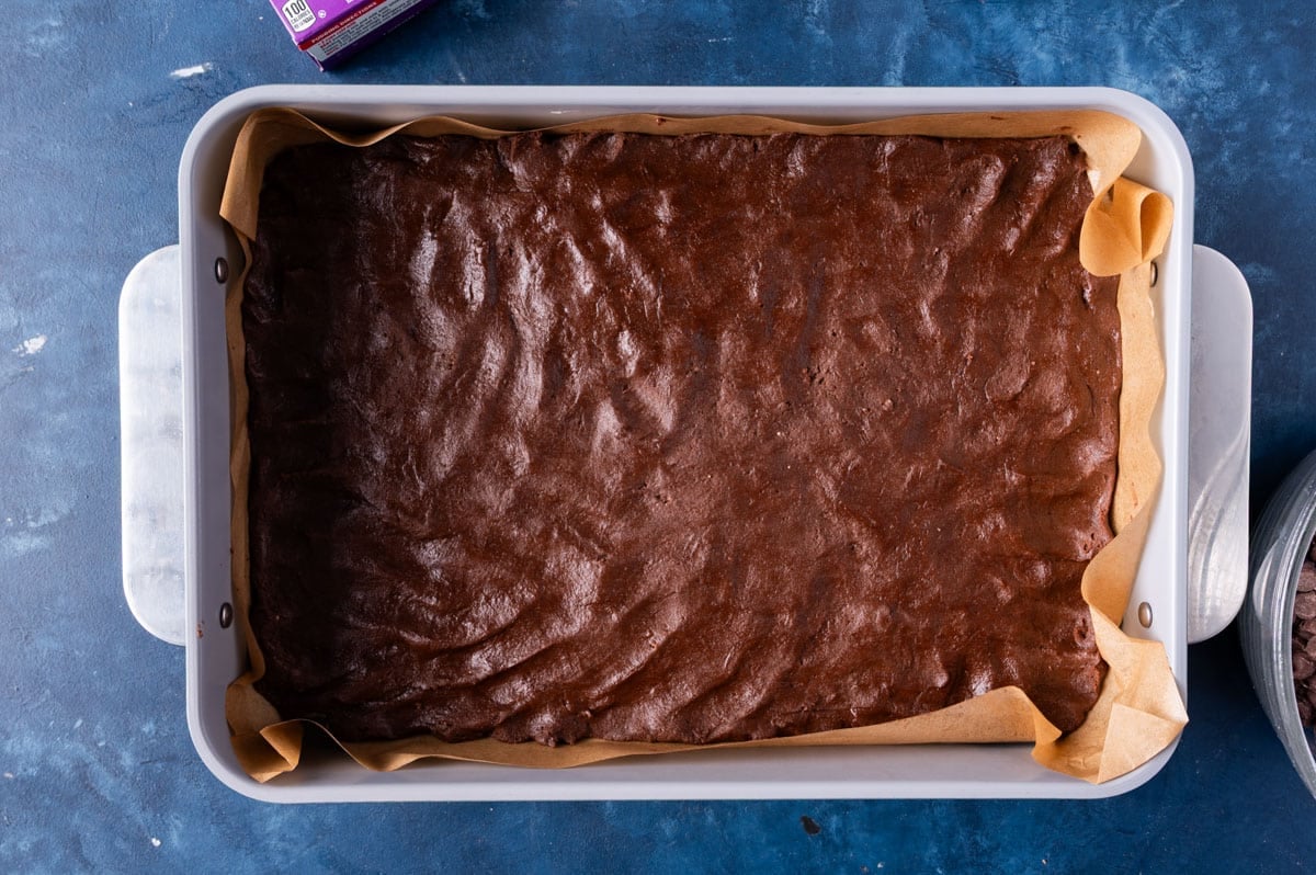 unbaked brownies in a pan