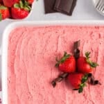 overhead view of chocolate strawberry cake with chocolate curls