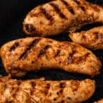 grilled chicken tenders in a pan
