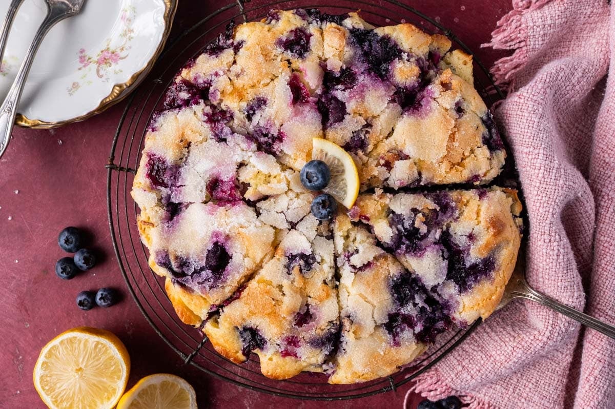 overhead view of a blueberry lemon cake on a table