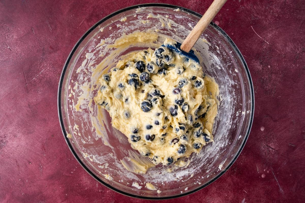 cake batter with blueberries in a bowl