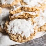 an oatmeal coconut cookie cut in half on a table
