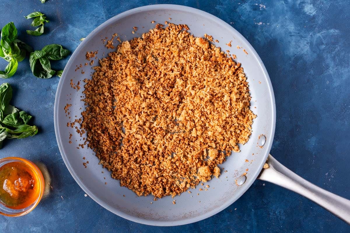 toasted parmesan bread crumbs in a skillet