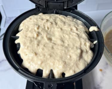 waffle batter in a waffle iron