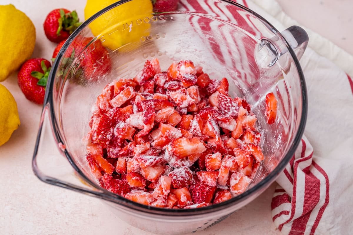 floured strawberries in a bowl