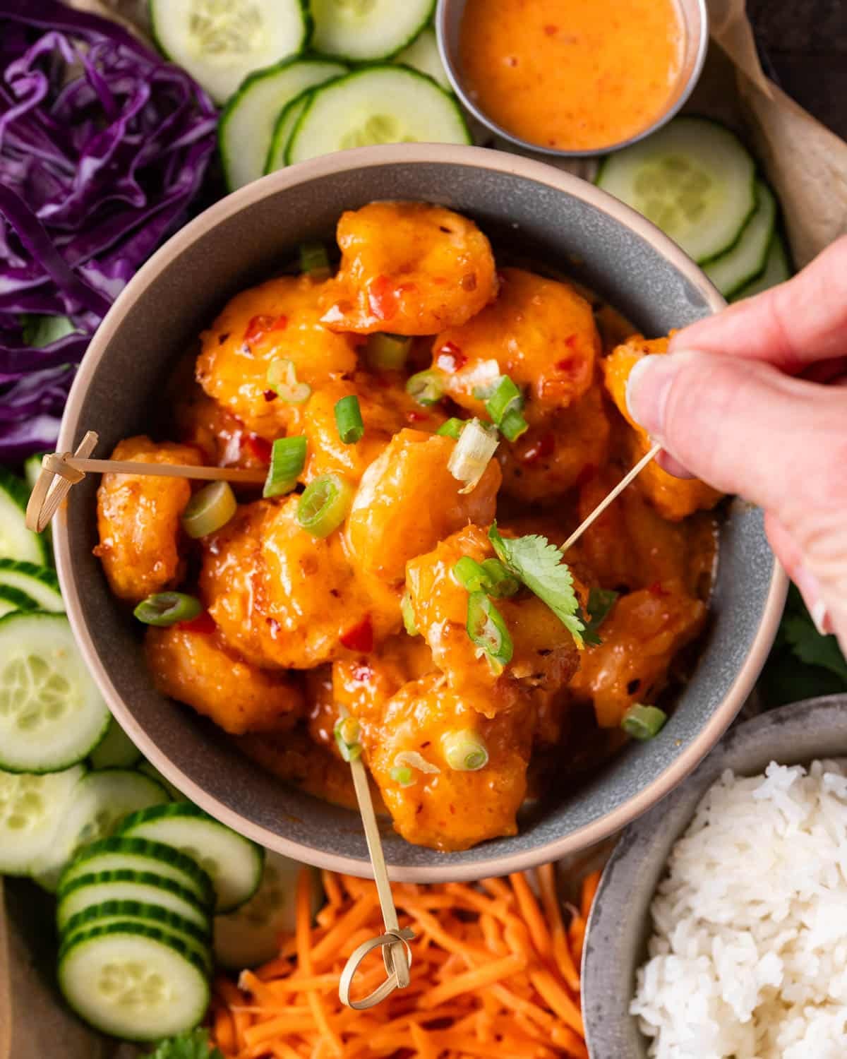 shrimp with bang bang sauce in a bowl