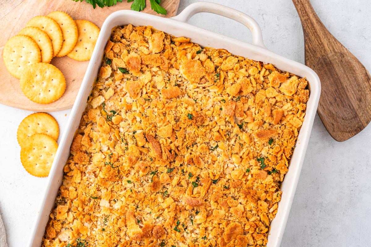baked chicken casserole with ritz crackers on a table
