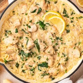 closeup of lemon chicken orzo in a skillet