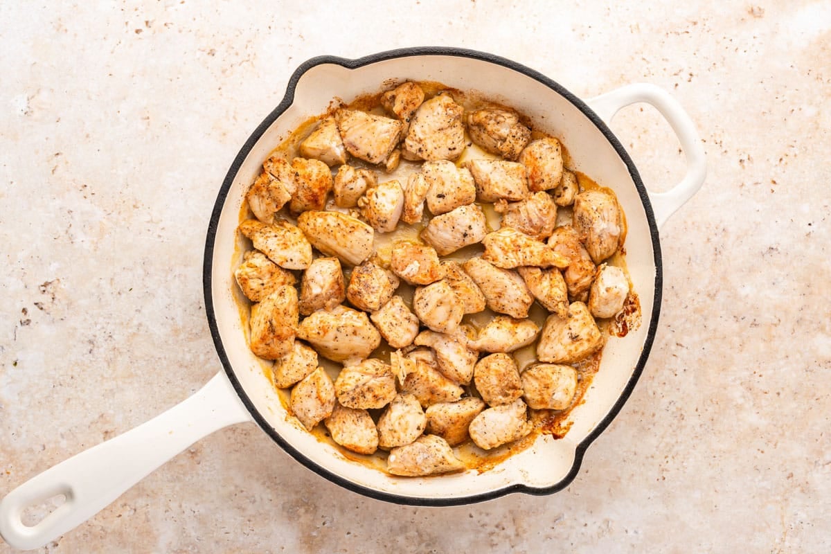 seasoned chicken in a skillet