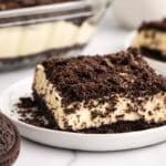a piece of oreo dirt cake on a plate