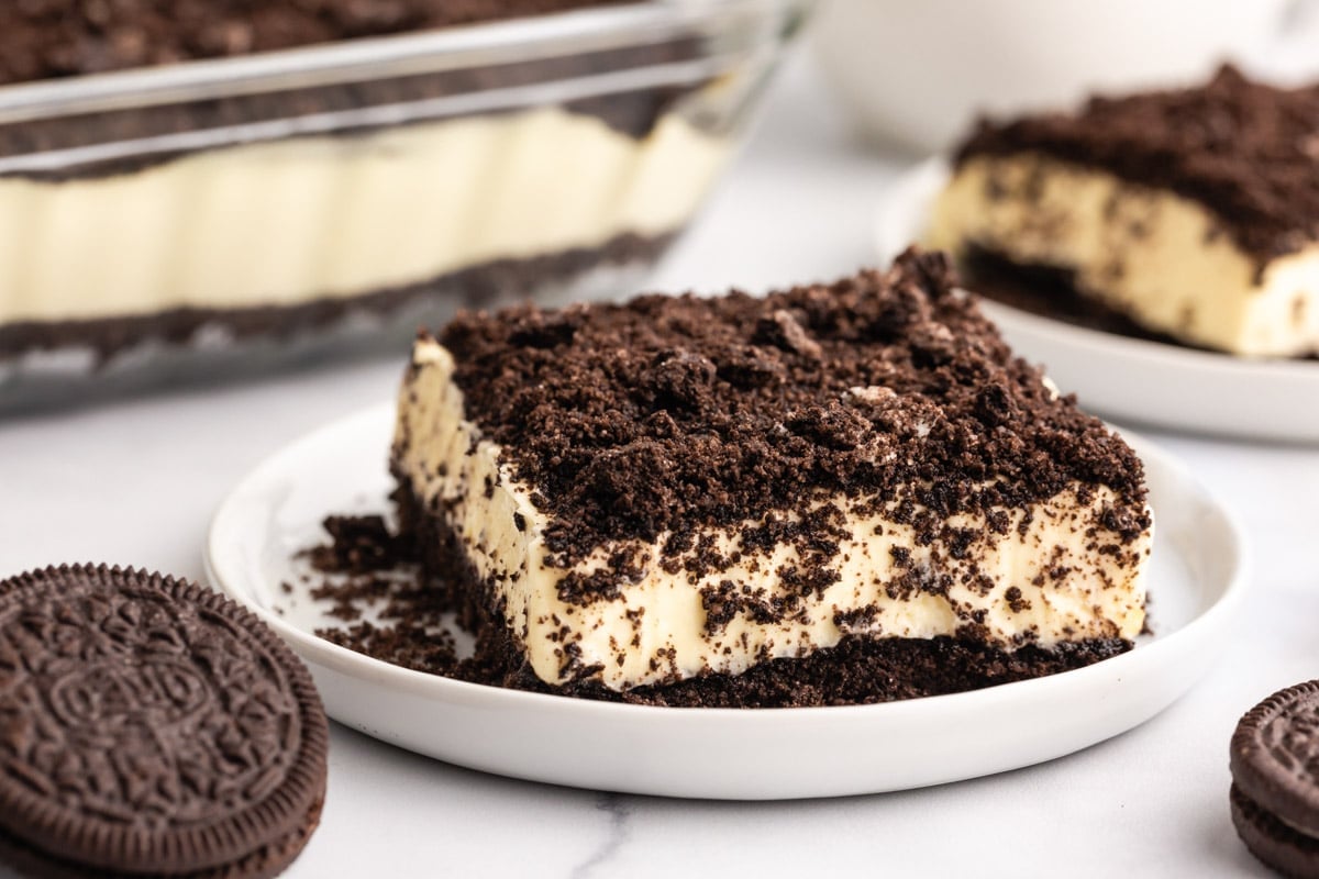 a piece of oreo dirt cake on a plate
