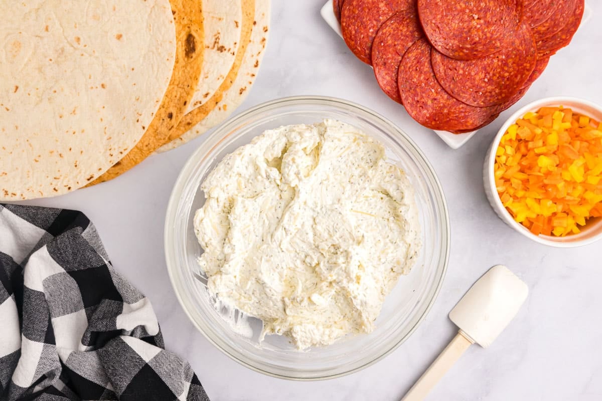cream cheese garlic spread in a bowl on a table