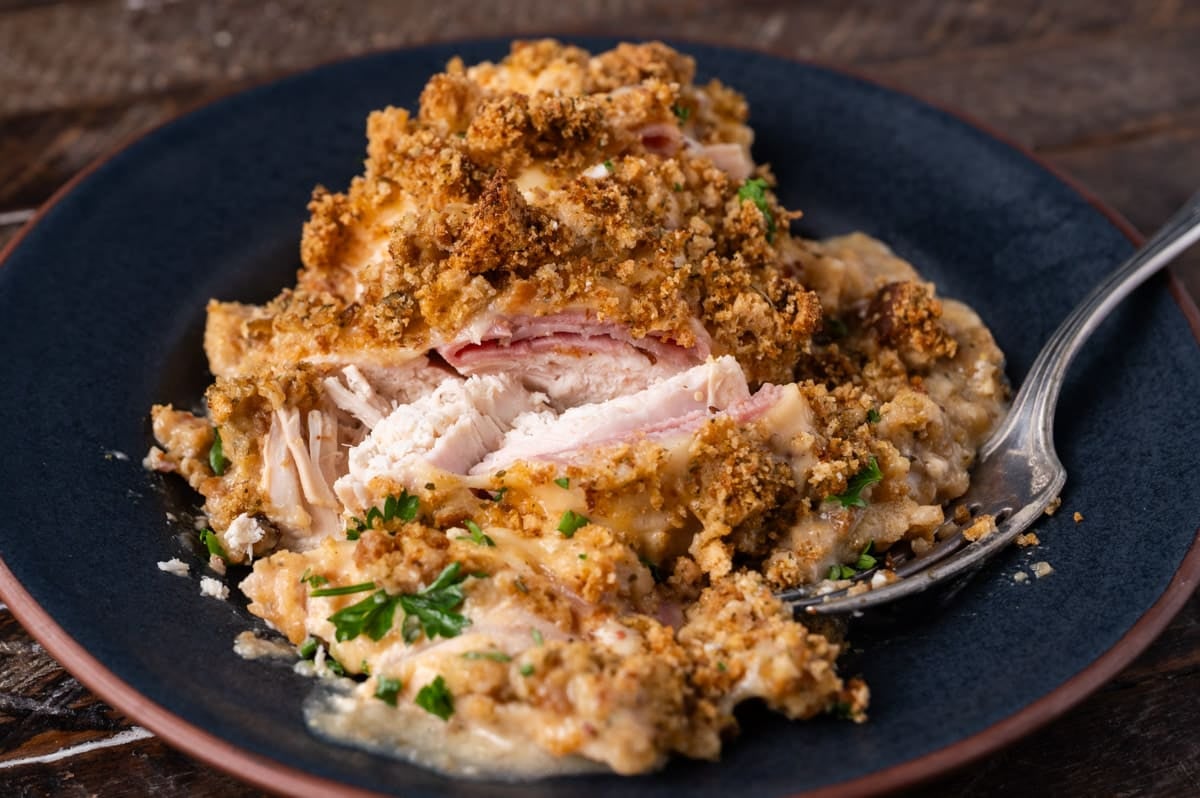 a piece of chicken cordon bleu on a table