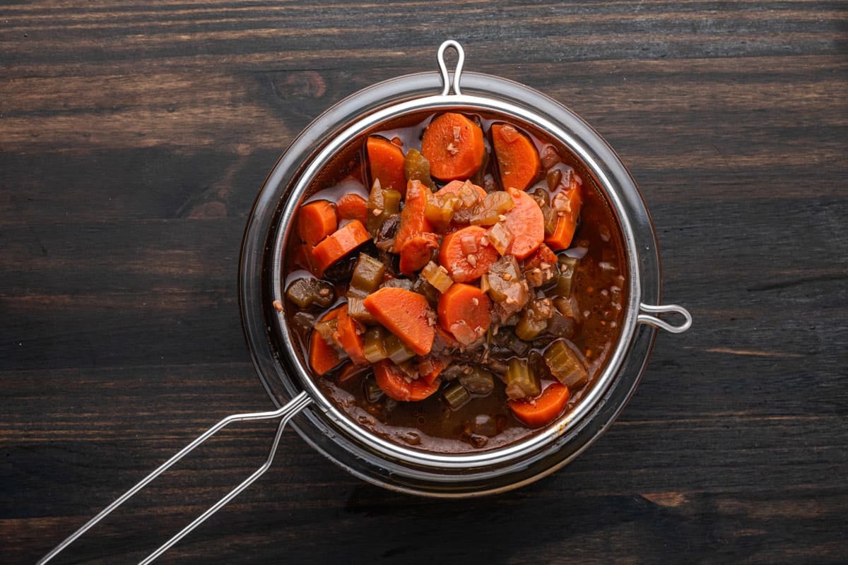 straining veggies from pot roast