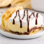 a piece of cream puff cake on a plate