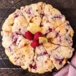 overhead view of lemon raspberry cake sliced 8 slices