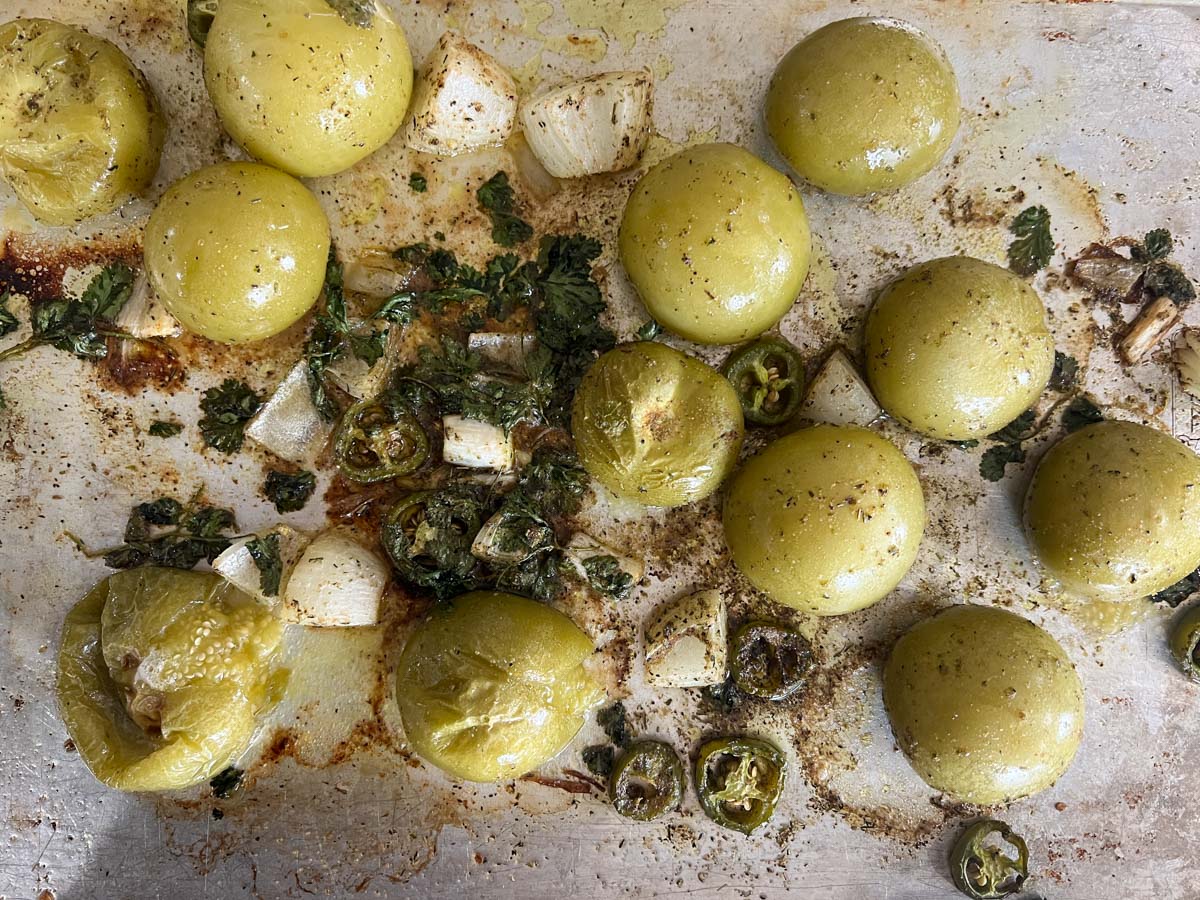 roasted veggies for salsa on a pan