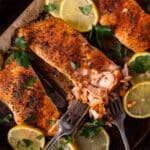 a piece of baked salmon on a baking sheet